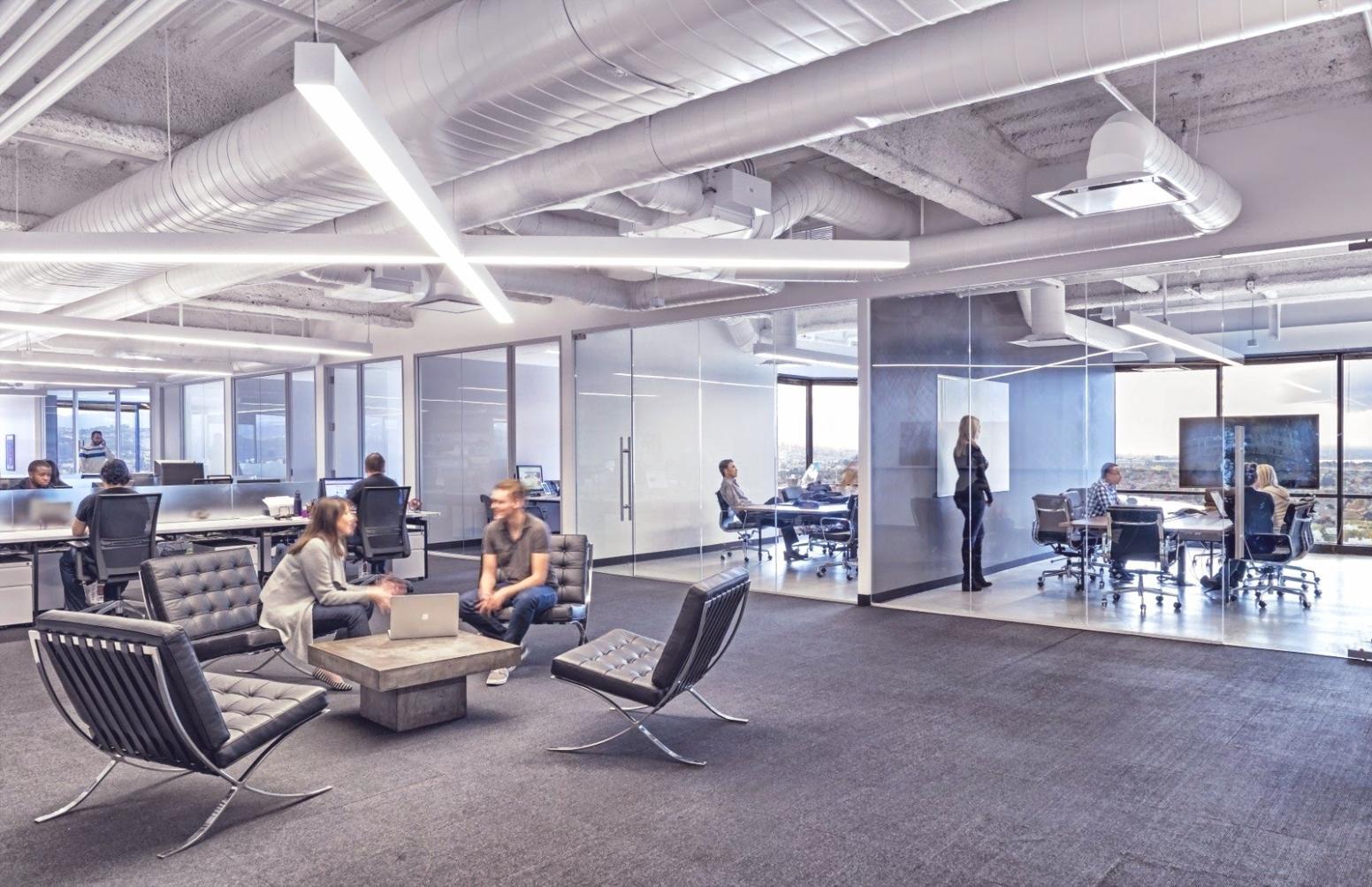 Participants collaborating on cross-industry workshop assignments